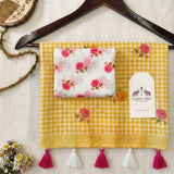Bright Yellow Linen Cotton Checks Saree with Floral Motifs & White Floral Blouse