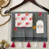 Timeless Black Linen Cotton Checks Saree with Subtle Floral Prints & White Floral Blouse