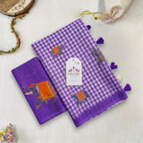 Graceful Purple Linen Cotton Checks Saree with Elephant Motifs & White Floral Blouse