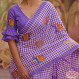 Graceful Purple Linen Cotton Checks Saree with Elephant Motifs & White Floral Blouse