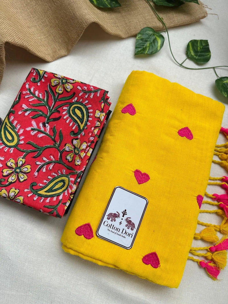 Bright yellow cotton handloom saree with red printed blouse