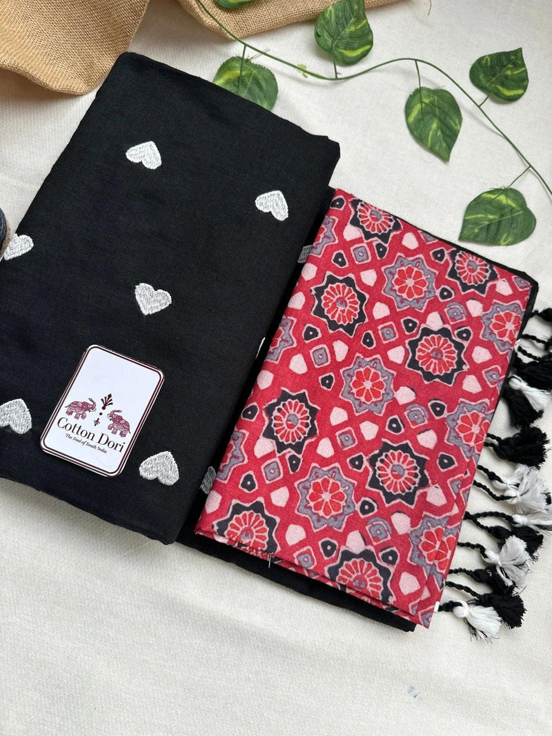 Rich black embroidered cotton handloom saree with red printed blouse