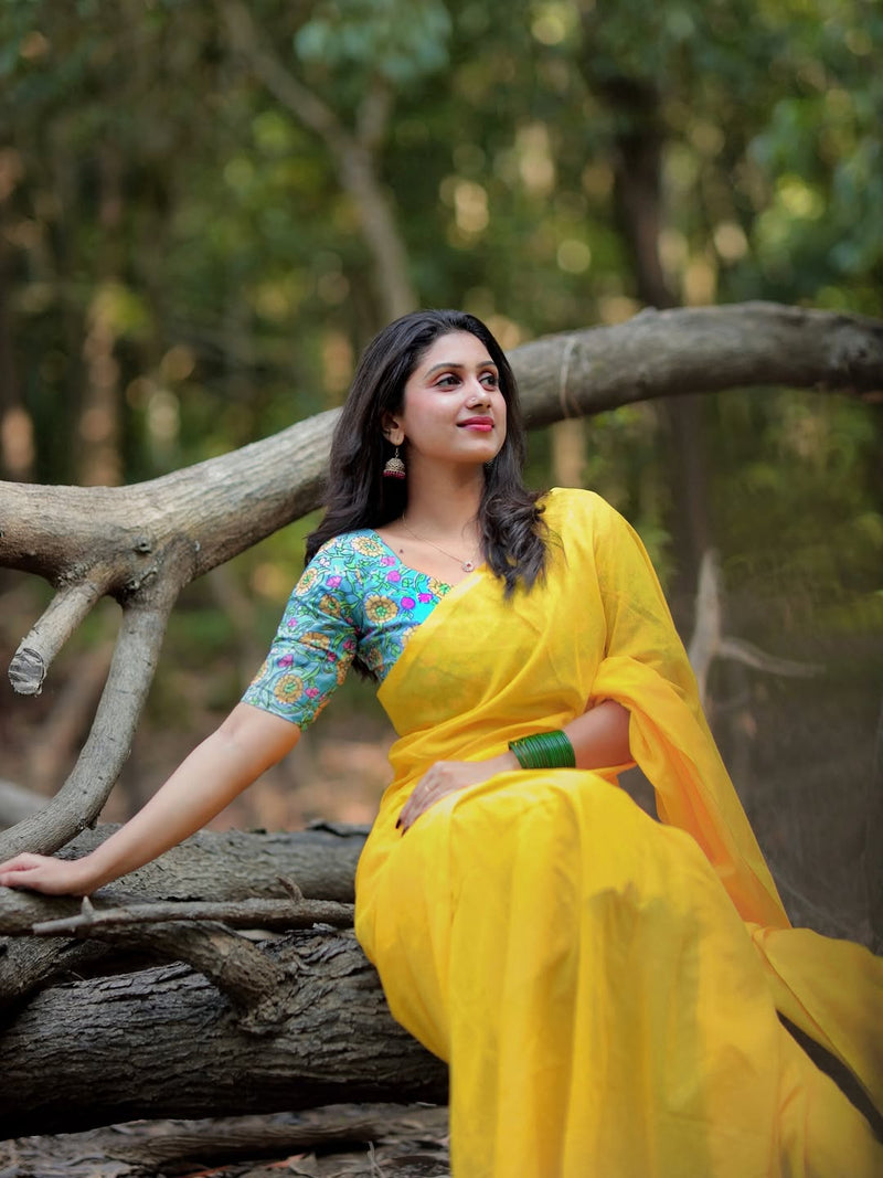 Gorgeous Yellow cotton handloom saree with printed blouse